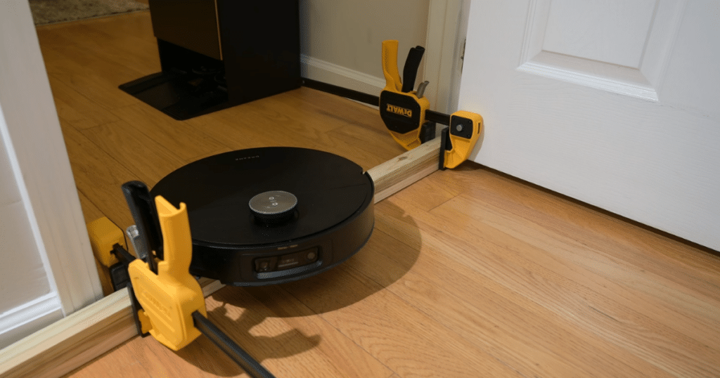 Dreame X60 Max Ultra Complete threshold | Vacuum Wars Dreame X60 Max Ultra Complete robot vacuum climbing a high door threshold during 51mm obstacle test