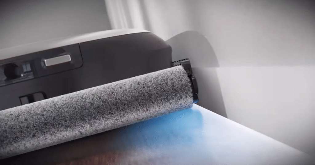 Eufy S2 edge extend | Vacuum Wars Eufy Omni S2 robot vacuum mop roller extending to edge with raised mop for carpet cleaning