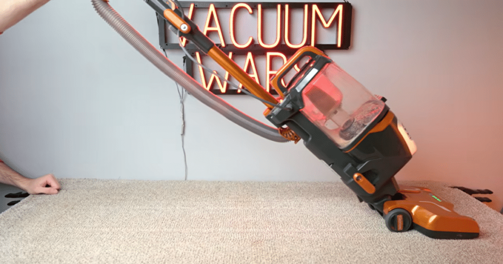 Kenmore FeatherLite Upright Vacuuming Carpet | Vacuum Wars The Kenmore Featherlite completing the carpet deep clean test at the Vacuum Wars studio.
