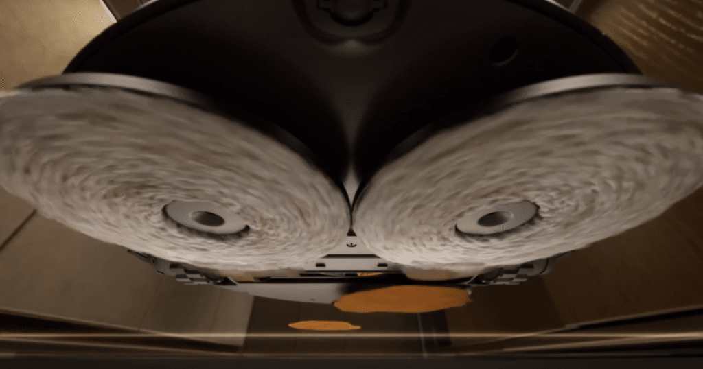 Roborock Saros 20 Spinning Mop Pads | Vacuum Wars Underside view of the Roborock Saros 20 showing its dual rotating mop pads designed for scrubbing hard floors.
