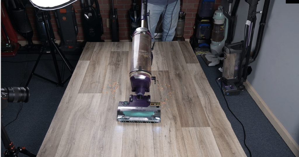 Shark PowerDetect Debris Pickup on Hard floor | Vacuum Wars Shark PowerDetect upright vacuum performing a hard floor debris pickup test