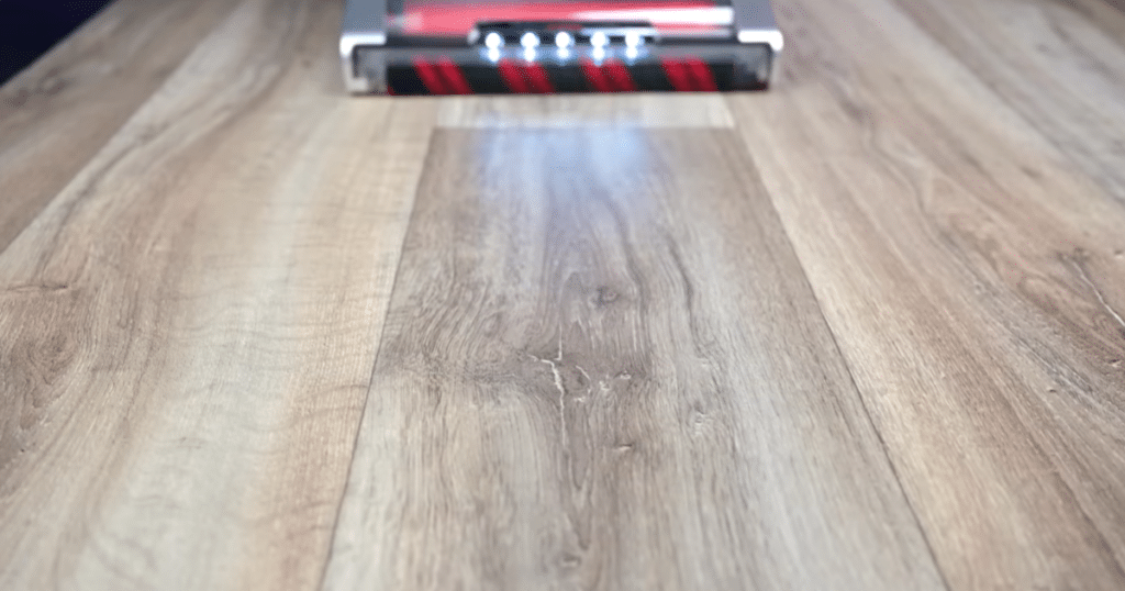 Shark Stratos Upright Vacuum Hard Floor Test2 | Vacuum Wars Shark Stratos Upright Vacuum successfully vacuuming medium sized debris on the surface of a hard floor.