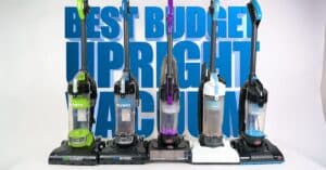 | Vacuum Wars Five budget upright vacuums lined up in front of large blue text reading “Best Budget Upright Vacuum,” including two Eureka Airspeed models, the Bissell CleanView Compact Turbo, an Amazon Basics upright, and a Bissell PowerForce Compact.