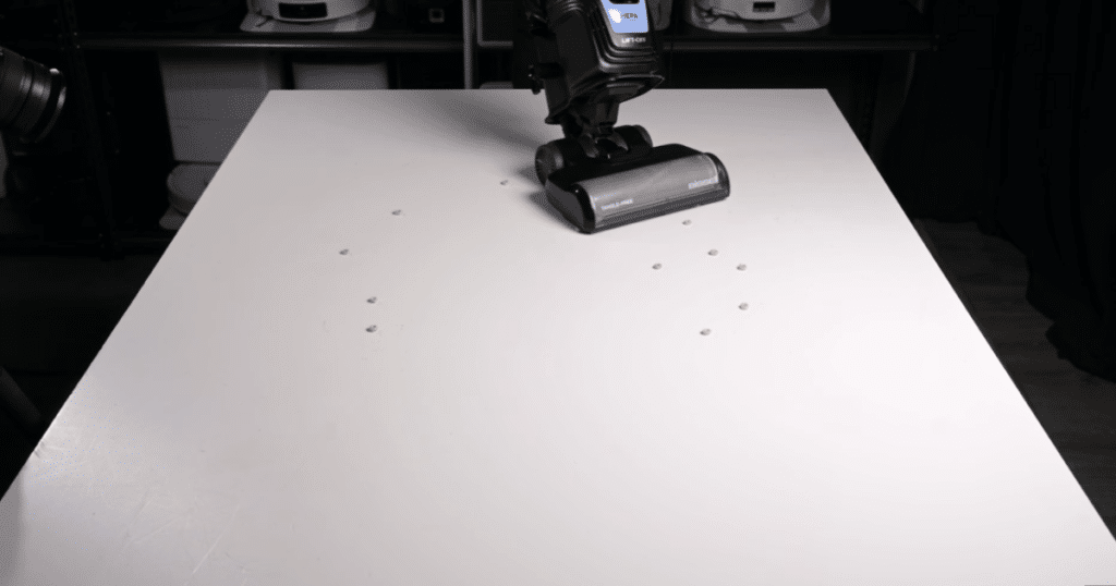 Bissell Pet Hair Eraser Allergen Lift-Off 39883 Hard Floor Pickup Test 1 | Vacuum Wars Bissell Pet Hair Eraser Allergen Lift-Off 39883 Approaching Large Debris on a Hard Floor