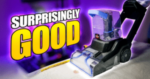 Compact carpet cleaning machine on a white carpet with a bold purple glow and the caption 'SURPRISINGLY GOOD' in yellow letters