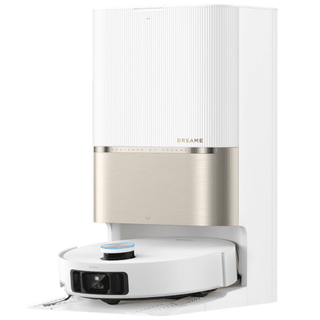 White wall-mounted appliance with a beige front panel; a circular robotic vacuum dock sits on the floor in front.