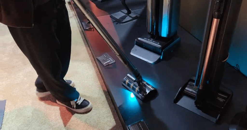 Dreame Air Demo | Vacuum Wars Dreame Air cordless stick vacuum in use demonstrating lightweight design and maneuverable floor brush at Dreame Next event