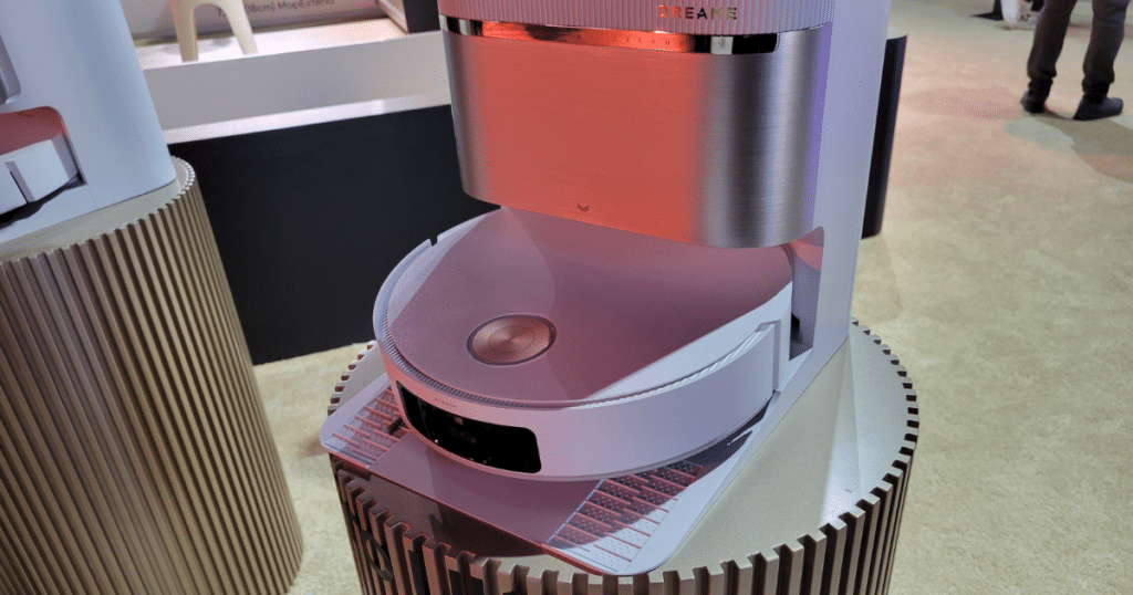 Dreame L60 Pro Ultra robot vacuum and docking station on display showing flagship design and all-in-one cleaning base