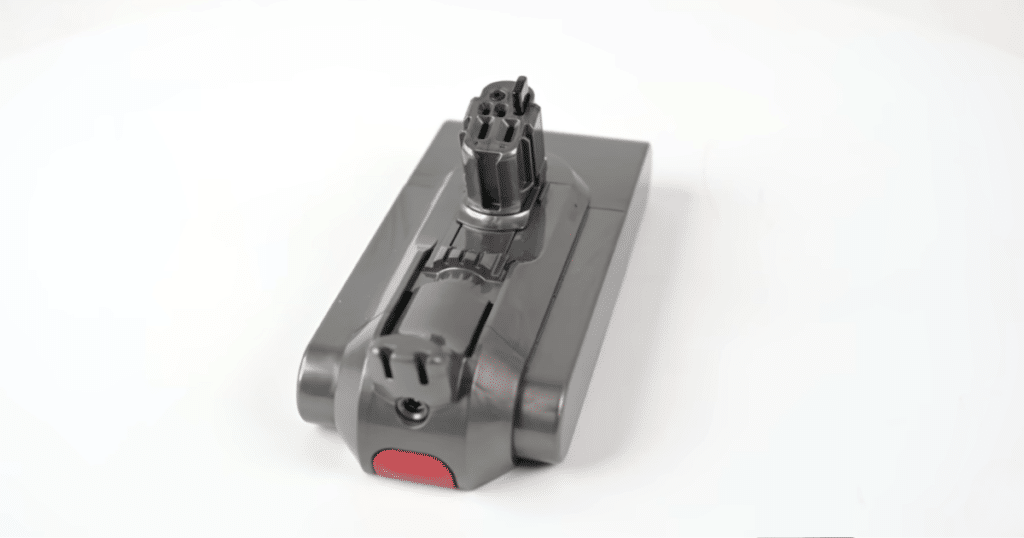 Dyson V15 Detect Detachable Battery | Vacuum Wars Detachable battery pack for the Dyson V15 Detect cordless vacuum shown removed from the unit.