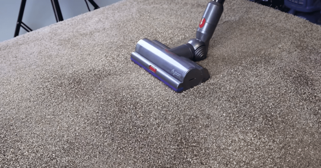 Dyson V15 Detect Vacuuming Carpet | Vacuum Wars Dyson V15 Detect cordless vacuum using the Digital Motorbar cleaner head on carpet during cleaning.
