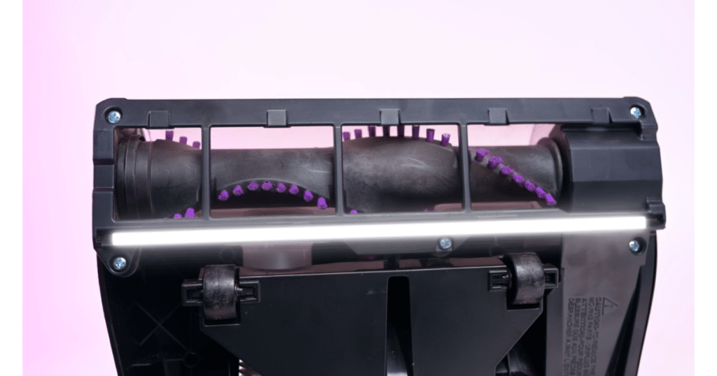 Floorhead Squeege on an Upright Vacuum | Vacuum Wars Underside of a budget upright vacuum floorhead showing brush roll and integrated squeegee strip used to improve hard floor debris pickup
