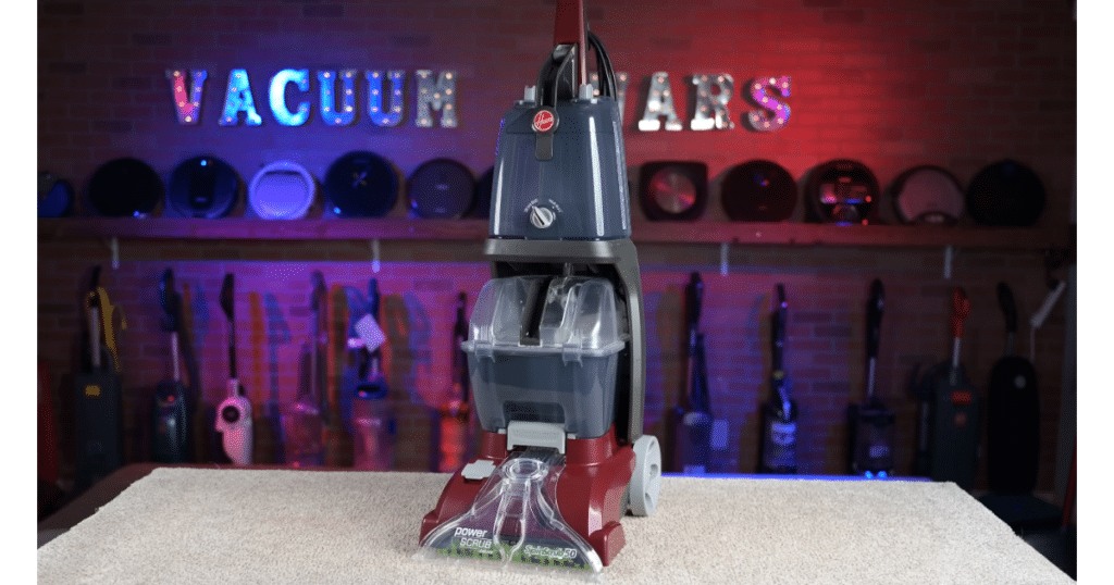 Hoover PowerScrub Deluxe at Vacuum Wars Best Budget | Vacuum Wars Hoover PowerScrub Deluxe carpet cleaner upright front view on test surface