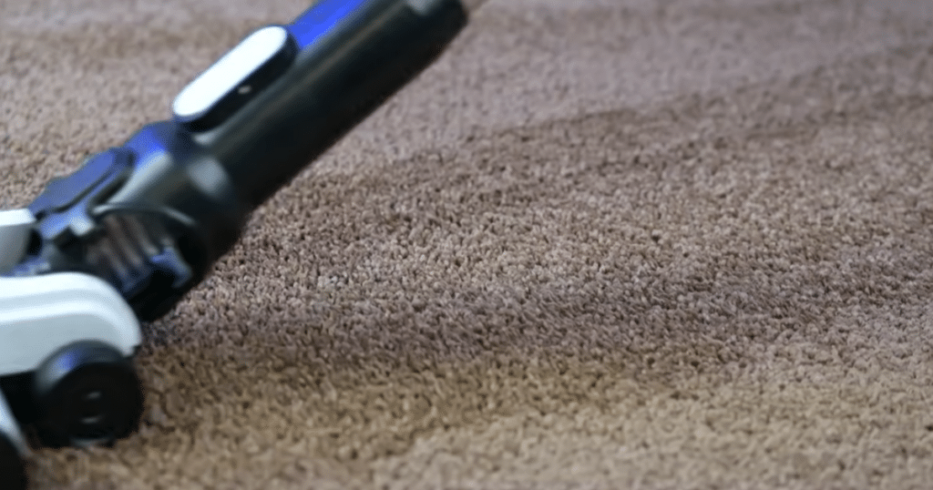 Levoit LVAC 200 Carpet 2 | Vacuum Wars Levoit LVAC 200 cordless vacuum successfully vacuuming large debris on a carpet.
