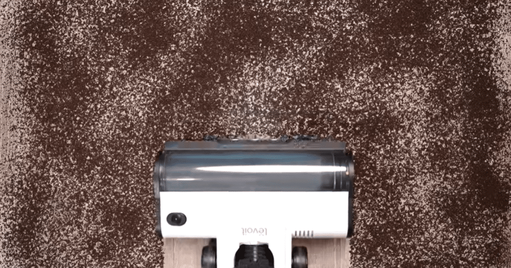 Levoit LVAC 200 Cordless Vacuum Hard Floor 1 | Vacuum Wars Levoit LVAC 200 cordless vacuum approaching fine debris on a hard floor
