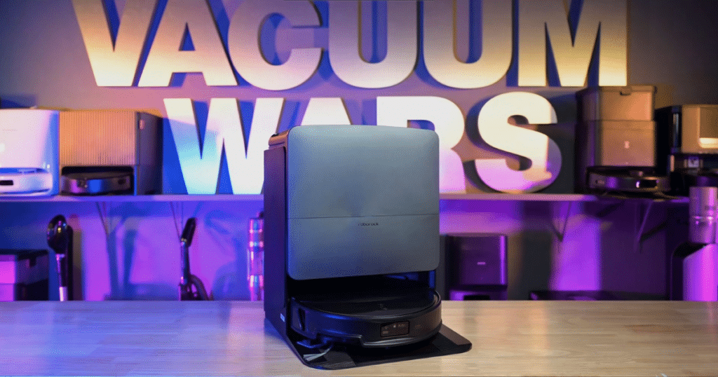 Roborock Saros 20 Hero | Vacuum Wars Roborock Saros 20 robot vacuum and dock on a table with Vacuum Wars studio background