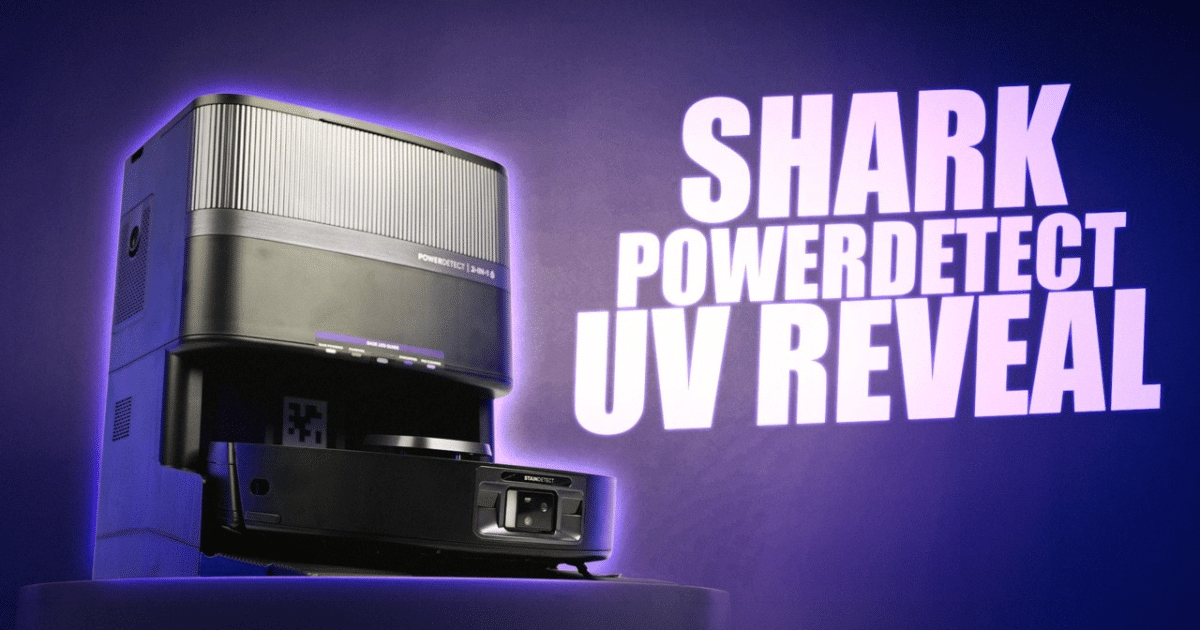 Promotional image showing a black UV detection device on a pedestal with purple glow and bold text: 'SHARK POWERDETECT UV REVEAL' on the wall to the right