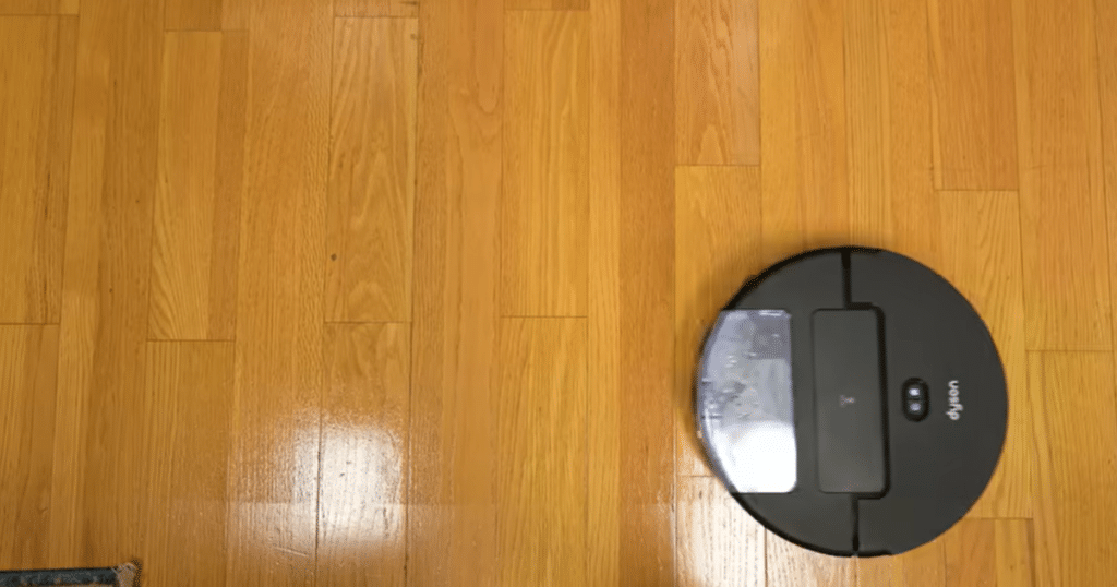 dyson spot + scrub ai mopping | Vacuum Wars Dyson Spot+Scrub AI robot vacuum mopping hardwood floor with roller mop system and controlled water distribution