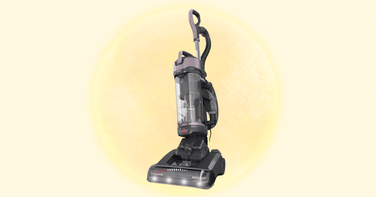 Bissell CleanView Max Allergen upright vacuum cleaner on a yellow background