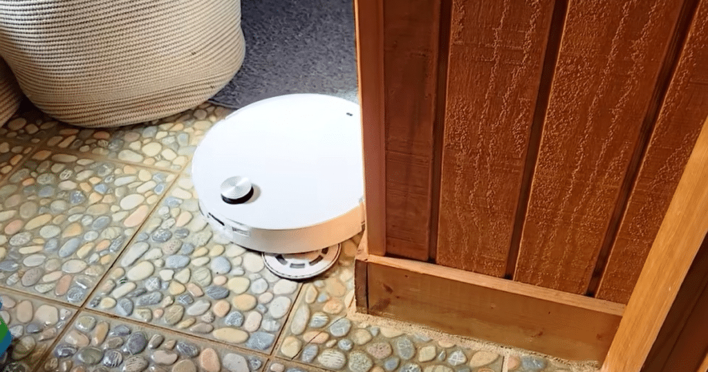 Roborock CurvX home bathroom mop | Vacuum Wars Roborock Qrevo CurvX mopping textured bathroom tile floor without mistaking it for carpet during real-world testing