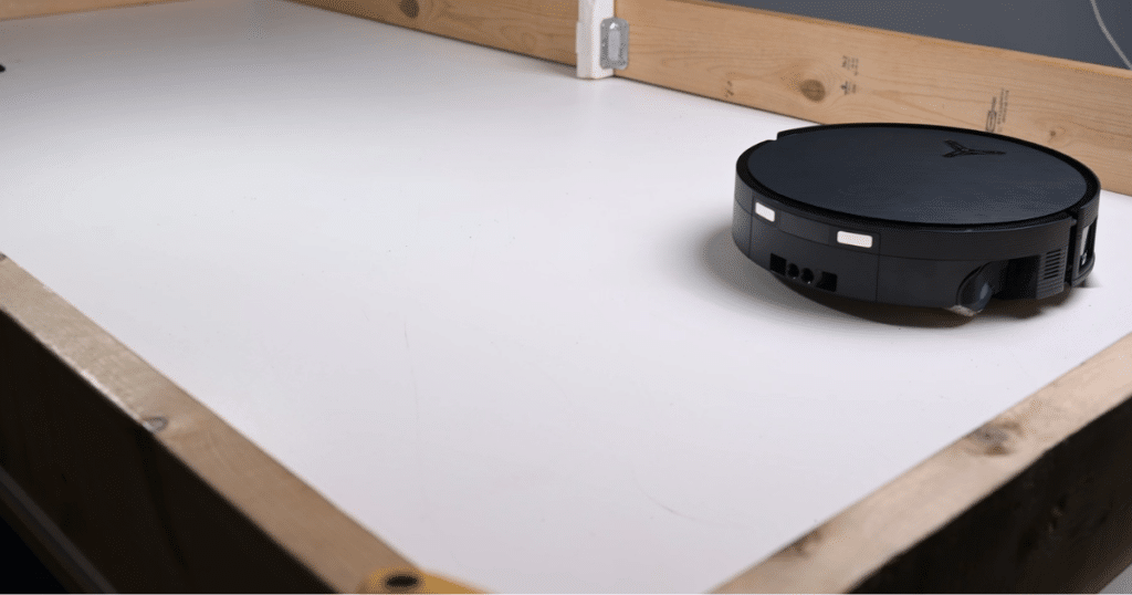 Ecovacs X12 OmniCyclone Hard Floor Fine Debris 2 | Vacuum Wars The Ecovacs X12 OmniCyclone successfully vacuuming fine debris on a hard floor in our test environment