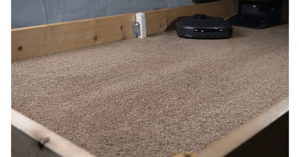 Eufy Omni C28 Robot Vacuum on Carpet 2 | Vacuum Wars The Eufy C28 robot vacuum and mop successfully vacuuming coffee grounds on a carpet.