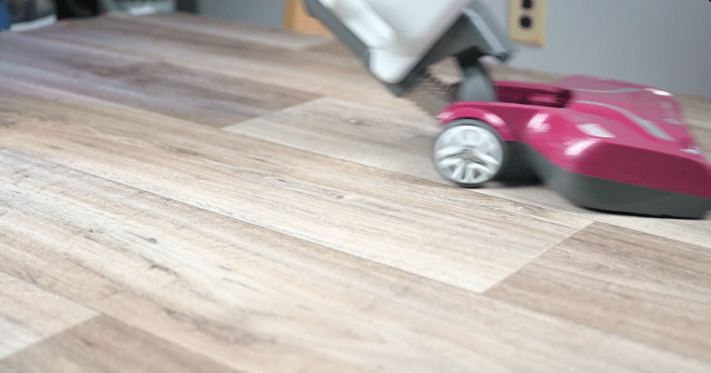 Kenmore Bagless DU5092 Hard Floor Debris 2 | Vacuum Wars Kenmore vacuum successfully vacuuming fine debris on a hard floor.