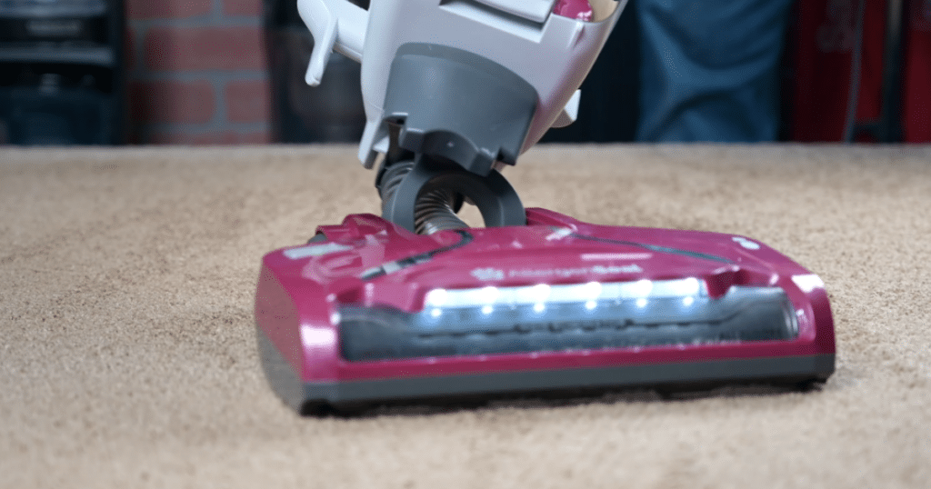 Kenmore Bagless DU5092 large debris on carpet 2 | Vacuum Wars Kenmore vacuum successfully vacuuming large debris on a carpet.