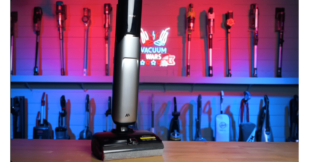 MOVA X4 Hero | Vacuum Wars The MOVA X4 Pro cordless floor cleaner is displayed in the Vacuum Wars studio with various cordless vacuums and floorcare products visible in the background.