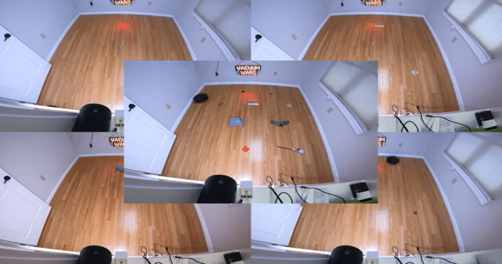 Roborock Qrevo Edge S5A obstacle avoidance | Vacuum Wars Roborock Qrevo Edge S5A obstacle avoidance test setup with cables, socks, toys, and small household objects placed on hard floors during Vacuum Wars testing.