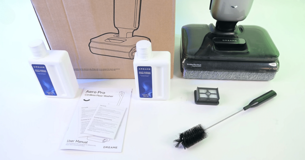 Dreame Aero Pro in the box Vacuum Wars | Vacuum Wars Dreame Aero Pro wet dry vacuum unboxed with cleaning solution bottles, user manual, cleaning brush, filter, and main floorhead.