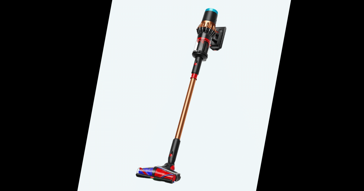 Cordless stick vacuum cleaner with copper wand and motorized floor brush on a light gradient background, angled diagonally.