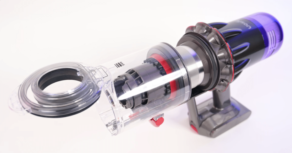 Dyson V9 Motorbar Dust Bin Capacity | Vacuum Wars Dyson V9 Motorbar dustbin shown open, highlighting the compact 350 ml bin design.