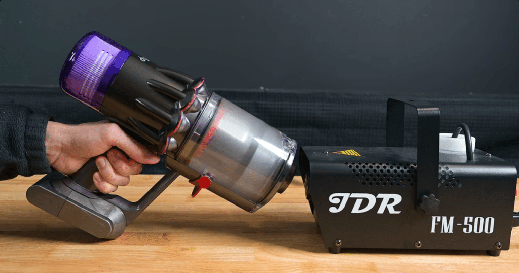 Dyson V9 Motorbar Filtration Tests | Vacuum Wars Dyson V9 Motorbar undergoing a fog test to check for visible filtration leakage from its sealed HEPA system.