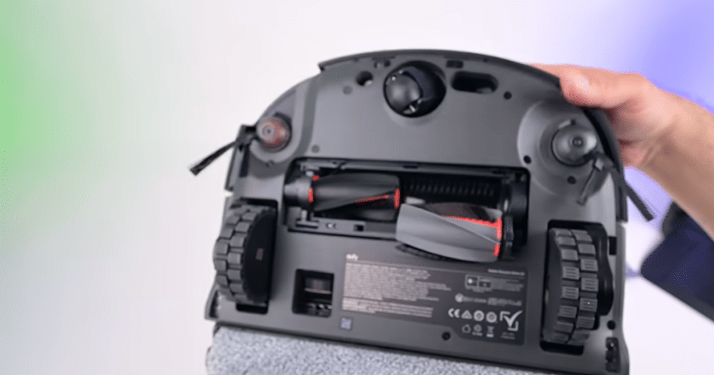 Eufy Omni S2 tangle test | Vacuum Wars Underside of the Eufy Omni S2 robot vacuum highlighting the DuoSpiral split main brush, which achieved a perfect 0% hair tangle rate in the Vacuum Wars 7-inch hair tangle test.