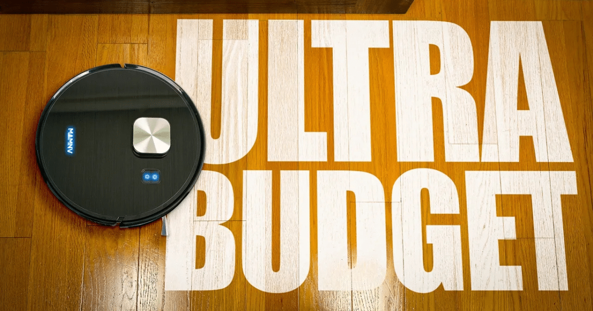 Robotic vacuum cleaner on a wooden floor beside oversized white letters reading ULTRA BUDGET.