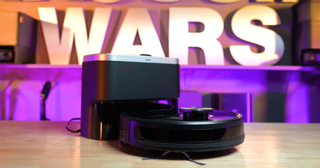 MAMNV D13S Max hero | Vacuum Wars MAMNV D13S Max robot vacuum and auto-empty dock displayed in the Vacuum Wars test studio, highlighting its LiDAR navigation system and self-emptying base station.