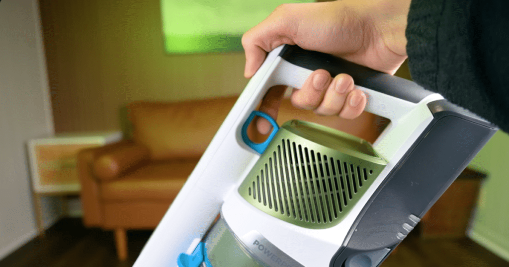 Shark PowerPro Flex Pet Trigger | Vacuum Wars Close-up of the Shark PowerPro Flex Pet Plus handle showing the trigger-activated boost control used to increase suction power during cleaning.