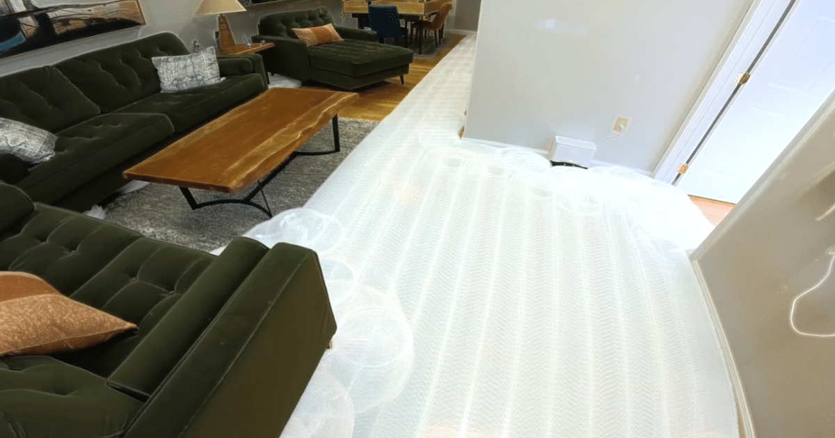 Navigation efficiency test showing the mapped cleaning path of the iLife A30 Pro in a living room, where it achieved 1.25 square meters per minute compared to 0.74 for the MOVA S10 and a 0.71 category average.