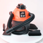 Armor All AA255W 2.5-gallon wet/dry vacuum with hose, claw nozzle, crevice tool, and detailing brushes.