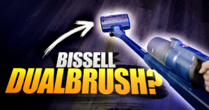 Bissell PowerClean DualBrush 4196K Cordless Vacuum Review Vacuum Wars | Vacuum Wars Blue Bissell handheld vacuum on a dark wooden floor with bold orange text reading 'DUALBRUSH?' overlaid.