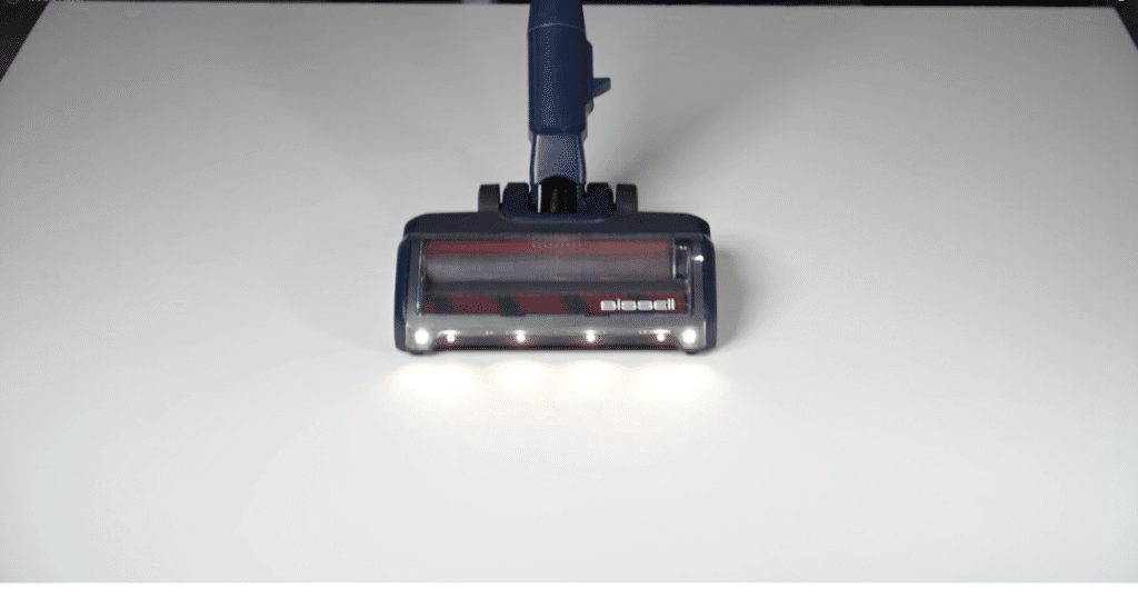 Bissell PowerClean DualBrush Cordless Hair Pickup Test 2 1 | Vacuum Wars Bissell PowerClean DualBrush cordless vacuum vacuuming pet hair on a hard floor during a pickup demonstration.