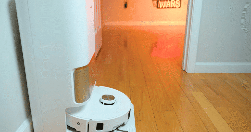 Dreame L60 Ultra PE base station | Vacuum Wars The Dreame L60 Ultra PE docks for automatic mop washing with boiling water and hot-air drying to reduce dirt buildup and odors.