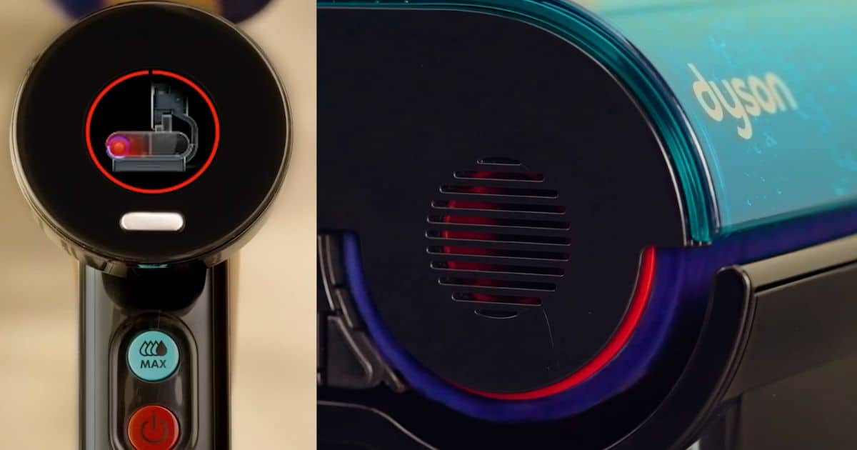 | Vacuum Wars Dyson Clean+Wash Hygiene display showing a roller maintenance graphic beside a close-up of the illuminated hot-air drying vent in the docking base.