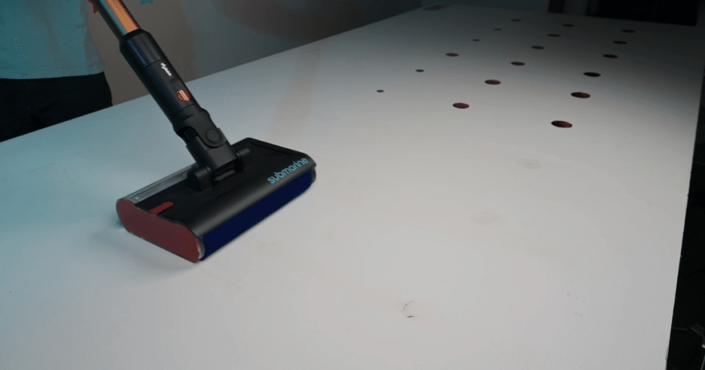 Dyson V16 Piston Animal Submarine Mopping Tests 2 Vacuum Wars | Vacuum Wars Dyson V16 Piston Animal Submarine wet-cleaning head removing dried stains from a white hard-floor test surface.
