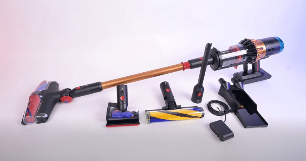 Dyson V16 Piston Animal with attachments | Vacuum Wars Dyson V16 Piston Animal Submarine cordless vacuum shown with its included cleaner heads, wet-cleaning head, handheld tools, battery, charger, and wall dock.
