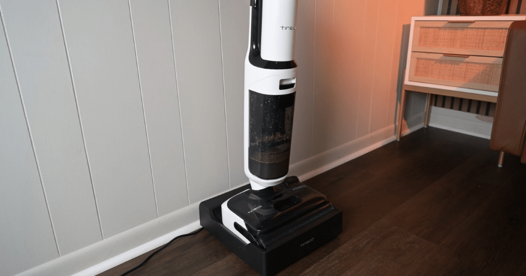 Tineco Floor ONE Stretch 6 wet dry vacuum self cleaning dock at Vacuum Wars | Vacuum Wars Tineco Floor ONE Stretch S6 sitting on its self-cleaning dock after hard floor cleaning.