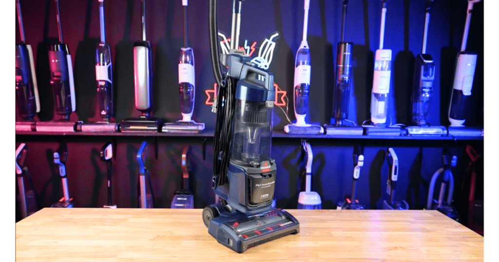 Bissell Pet Hair Eraser Dual Brush Vacuum cleaner at Vacuum Wars | Vacuum Wars Bissell Pet Hair Eraser DualBrush upright vacuum on the Vacuum Wars test bench, with other upright vacuums displayed in the background.