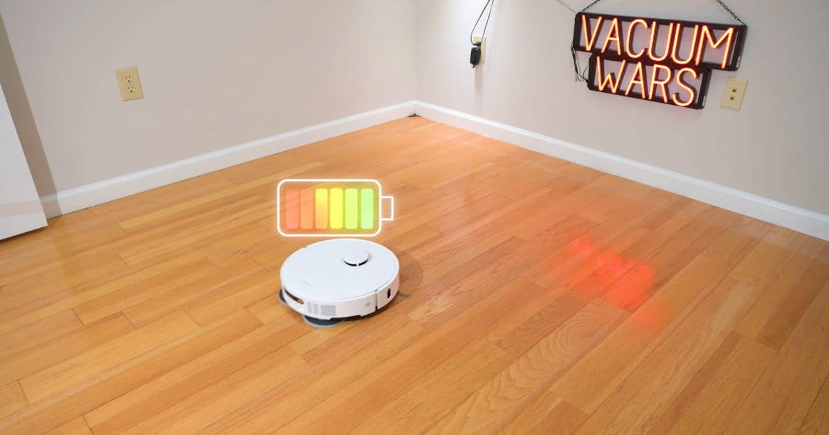 | Vacuum Wars Dreame D30 Ultra robot vacuum cleaning a hard floor with a battery graphic indicating its battery efficiency performance.