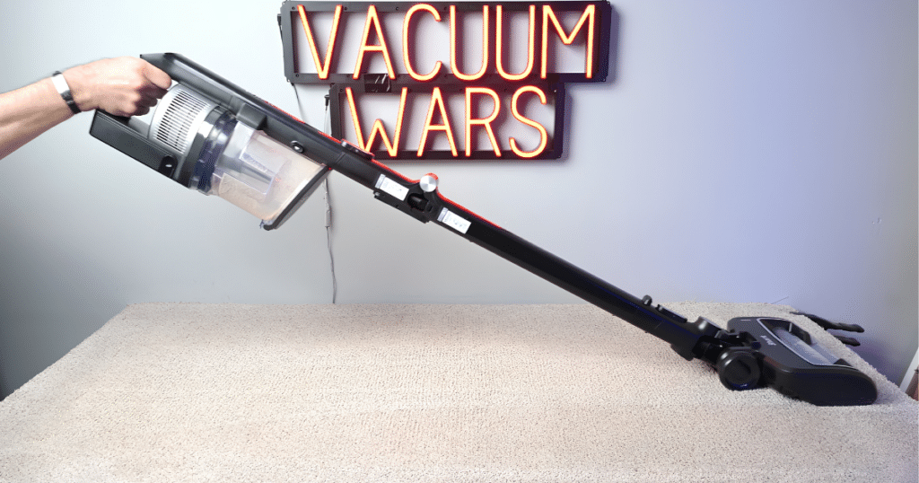 Shark Vertex Pro Carpet Deep Clean Test at Vacuum Wars | Vacuum Wars The Shark Vertex Pro cordless stick vacuum vacuuming carpet at the Vacuum Wars studio.