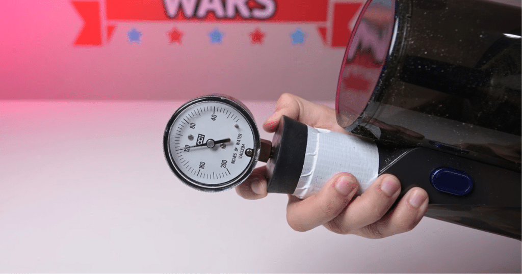 Testing Sealed Suction on a Cordless Vacuum at Vacuum Wars | Vacuum Wars Vacuum Wars testing cordless vacuum sealed suction with an analog manometer attached to the vacuum’s handle intake.